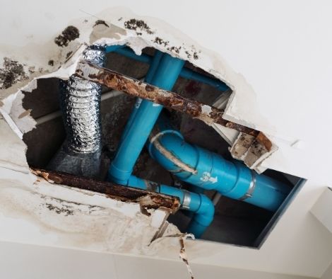 Water Damage Restoration Encinitas - Example Of Exposed Pipes Due To Water Damage